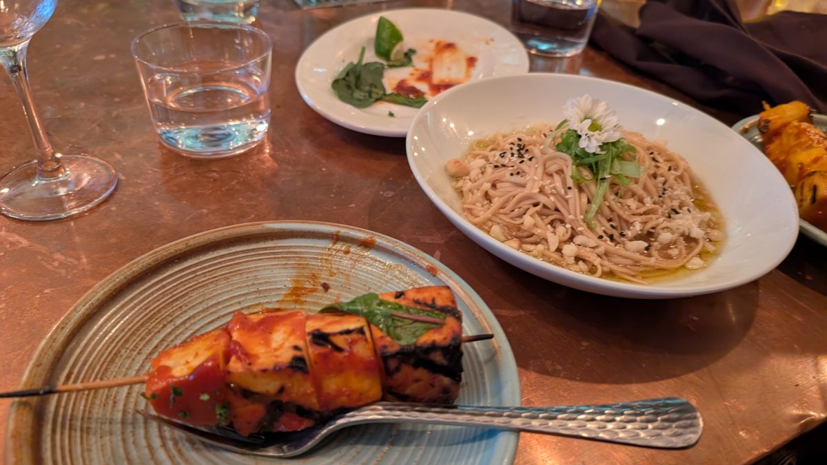 Vegan American food at aíso in The Castro, San Francisco Bay Area featuring garlic butter udon, soggy dollar
