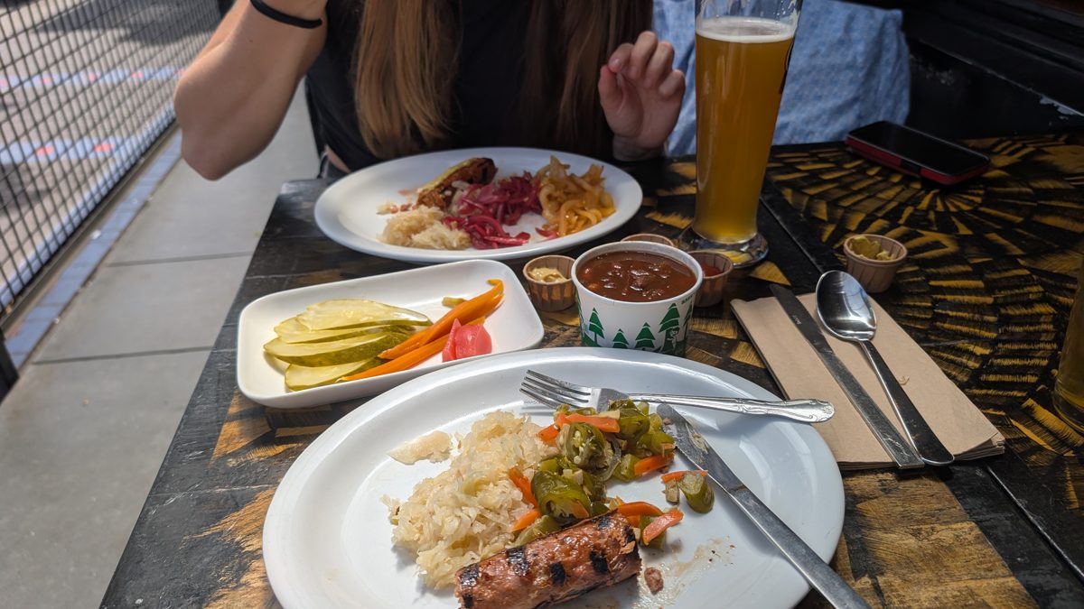 Vegan German food at Rosamunde Sausage Grill in The Mission, San Francisco Bay Area featuring beyond sausage, brussel sprouts, fries